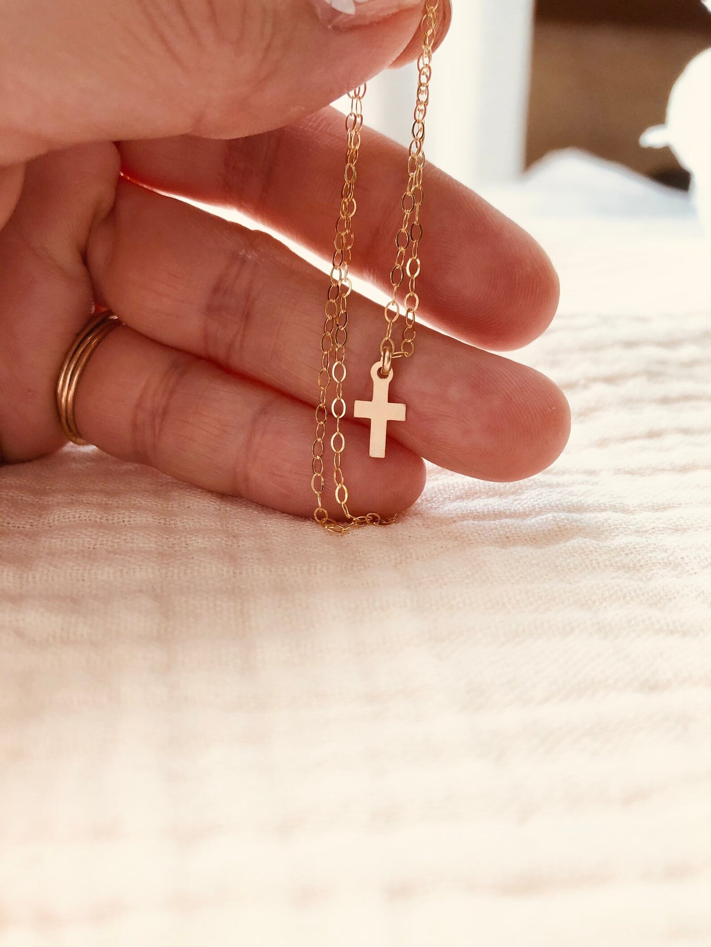 gold cross necklace, tiny cross pendant, dainty gold jewelry, everyday necklace, faith jewelry, minimal cross necklace, gold filled necklace, handmade in Wyoming, layering necklace, waterproof jewelry