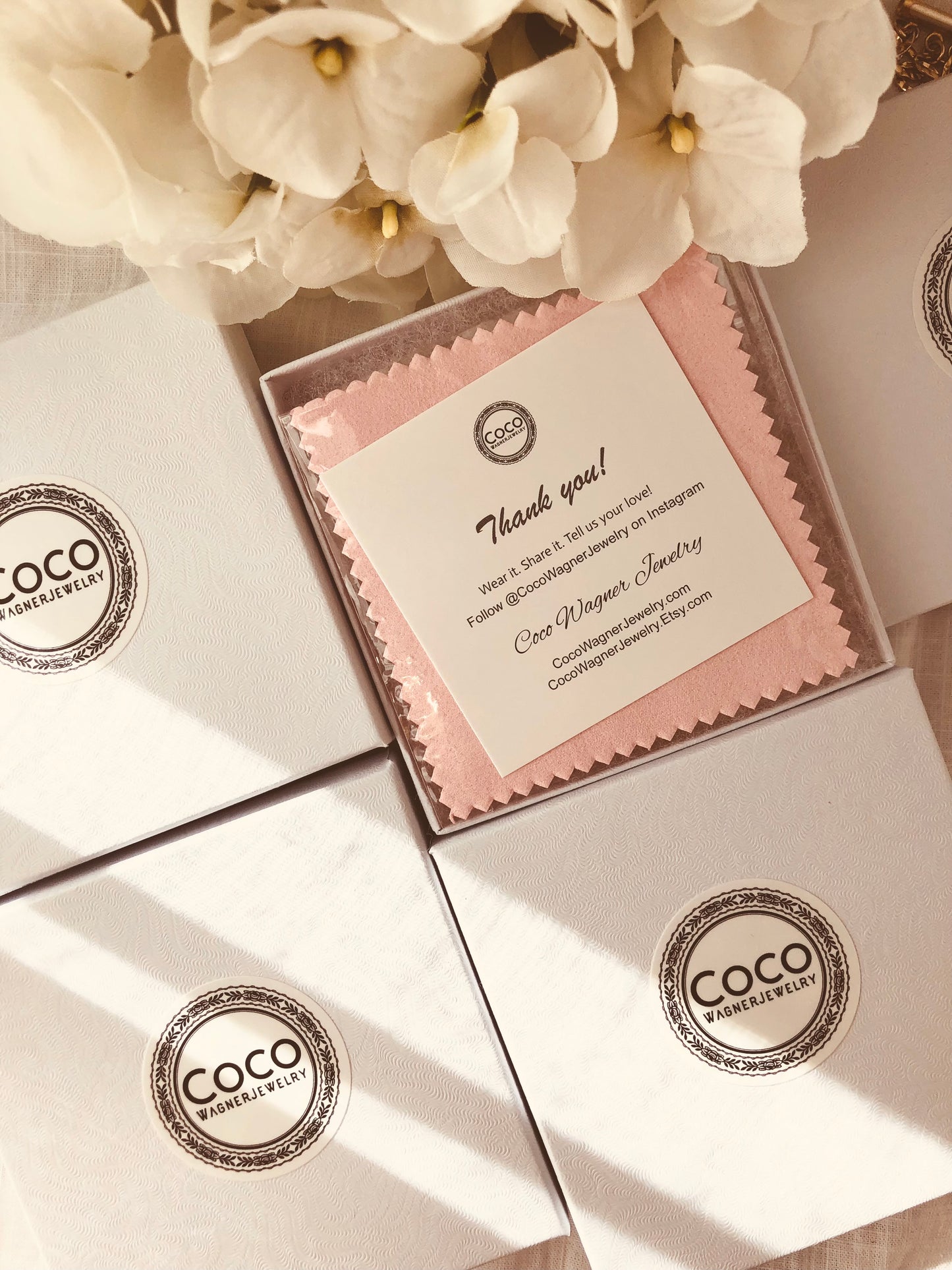 The order will arrive in a jewelry box and free polishing cloth.