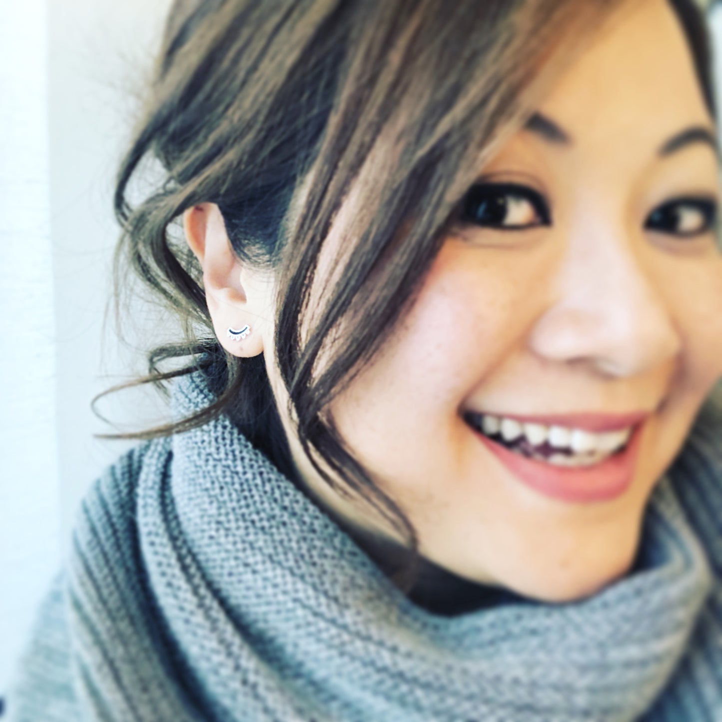 Modern Winking Eye Stud Earrings