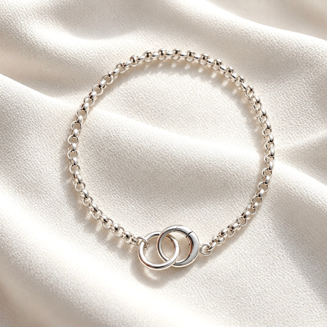sterling silver rolo chain bracelet with a 10mm push clasp. Add birthstones, tiny cross or custom initial charms. Made for everyday wear.