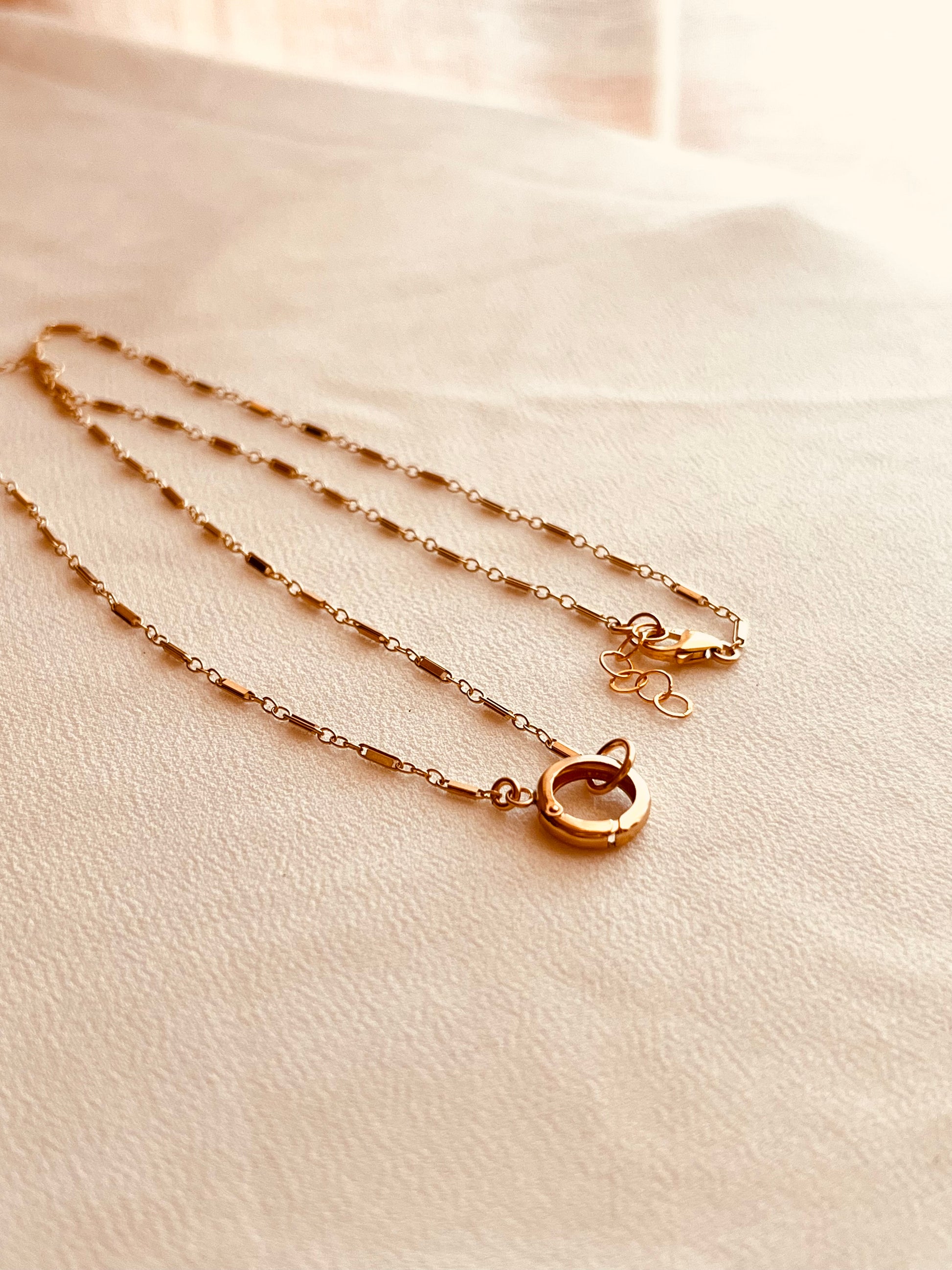 charm holder necklace, gold filled necklace, 14k gold filled jewelry, personalized necklace, dainty gold necklace, layering necklace, handmade jewelry, everyday necklace, minimalist jewelry, charm necklace, custom necklace, gift for her, holiday gift ideas, christmas gift, birthday gift, anniversary gift, pet lover jewelry, paw charm, pearl drop, initial tag, coco wagner design, made in wyoming, mountain studio jewelry