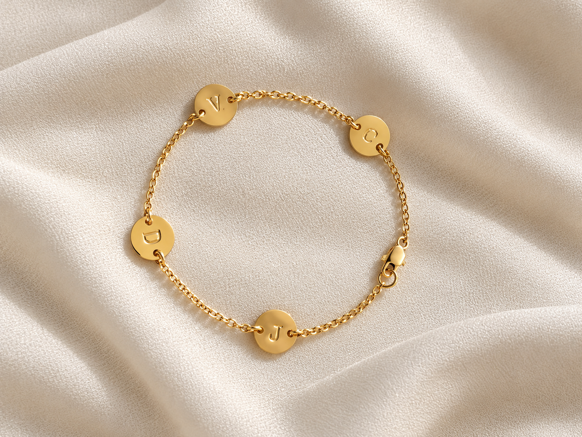 14K gold filled personalized family initial disc bracelet with four spaced letter charms, custom fit dainty bracelet for mom.