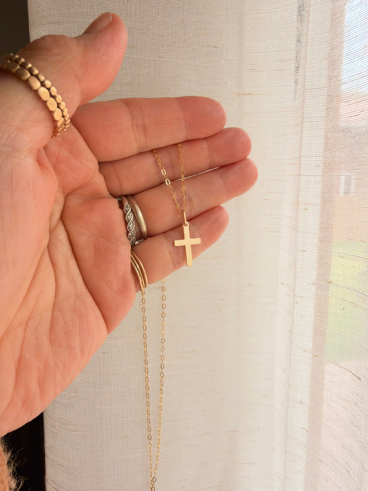Cross in hand Dainty 14K gold filled cross necklace with lightweight 10 × 16mm cross pendant