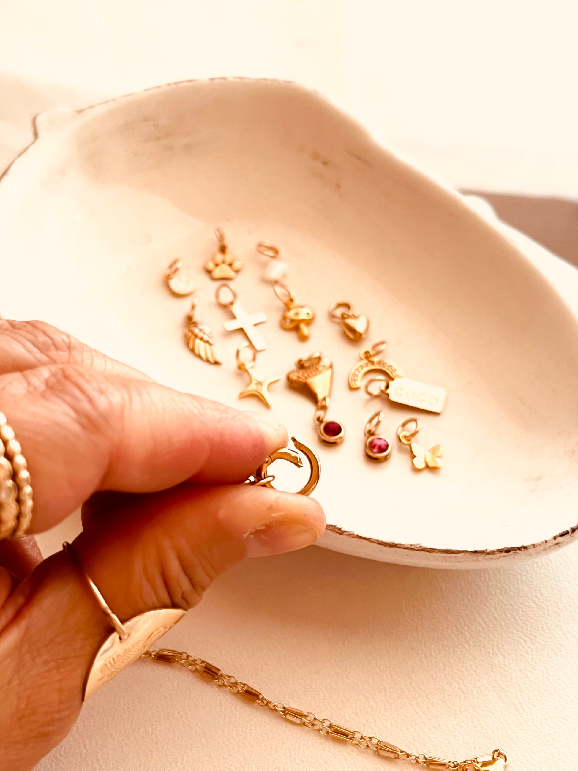 charm holder necklace, gold filled necklace, 14k gold filled jewelry, personalized necklace, dainty gold necklace, layering necklace, handmade jewelry, everyday necklace, minimalist jewelry, charm necklace, custom necklace, gift for her, holiday gift ideas, christmas gift, birthday gift, anniversary gift, pet lover jewelry, paw charm, pearl drop, initial tag, coco wagner design, made in wyoming, mountain studio jewelry