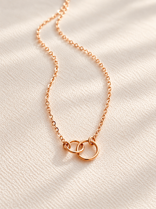 Shop a delicate 14K solid gold connected links necklace symbolizing love and connection. A timeless minimalist choker and meaningful gift for her.