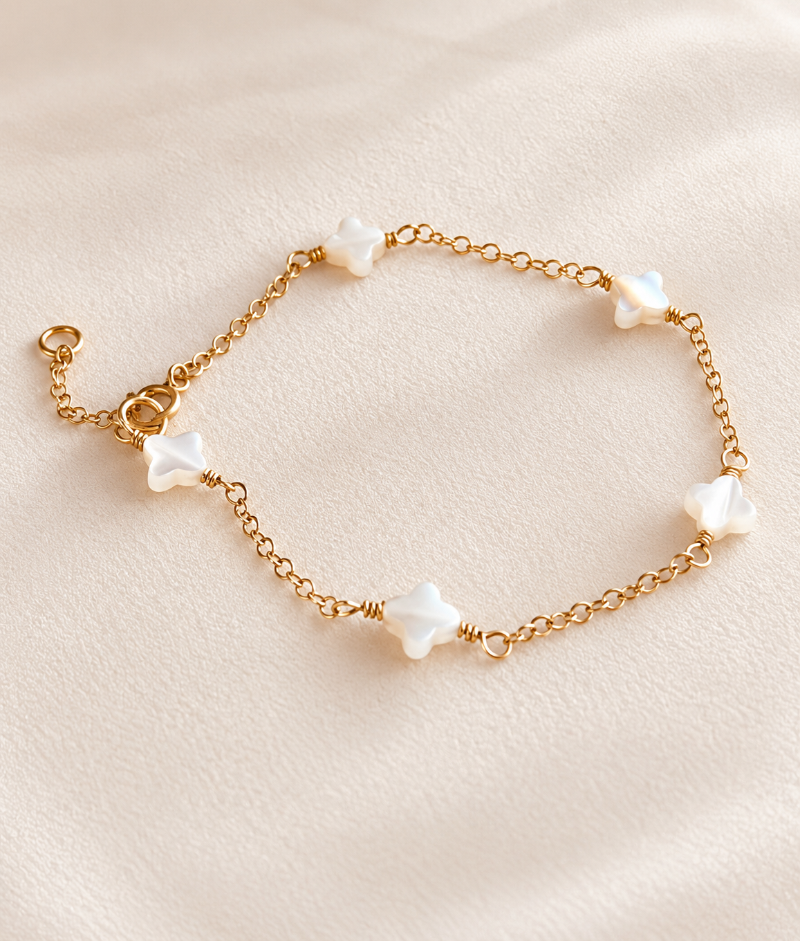 Mother of Pearl clover bracelet with 14K gold filled chain handmade by Coco Wagner Design