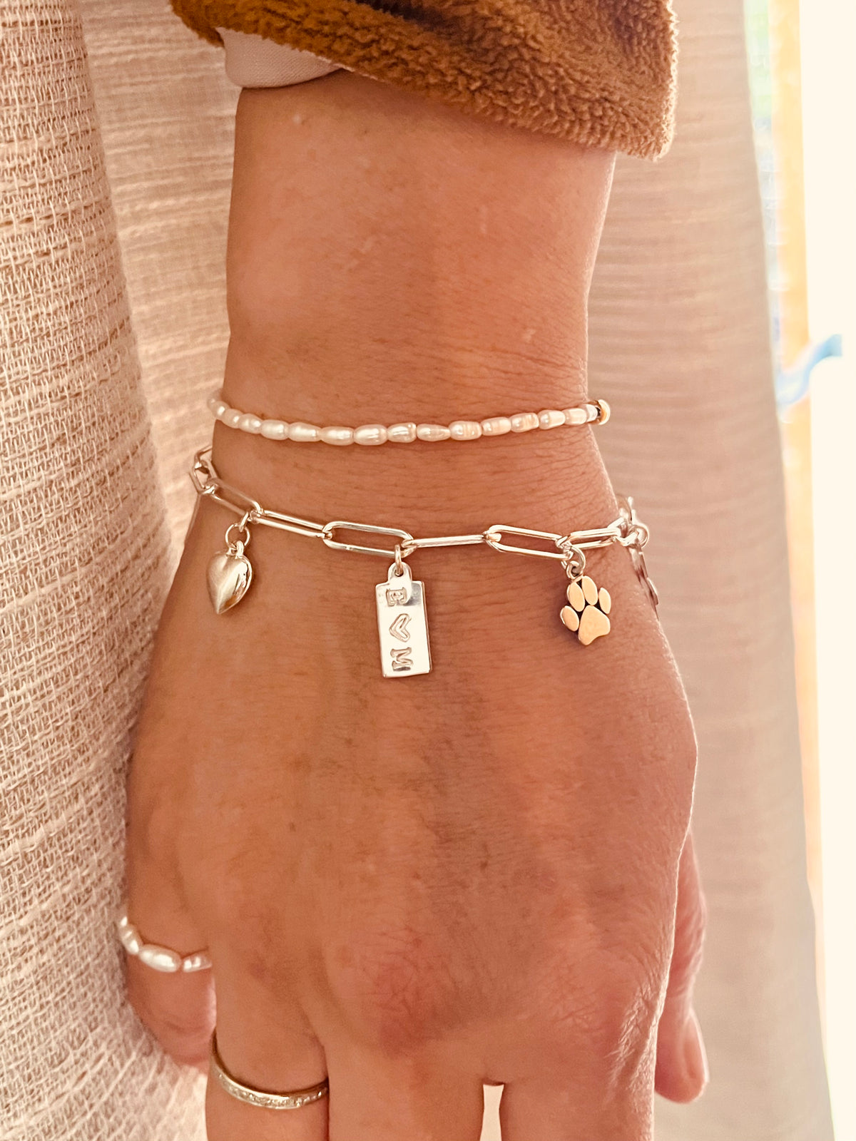 Sterling silver personalized paperclip charm bracelet with custom initial tag heart cross and charms
