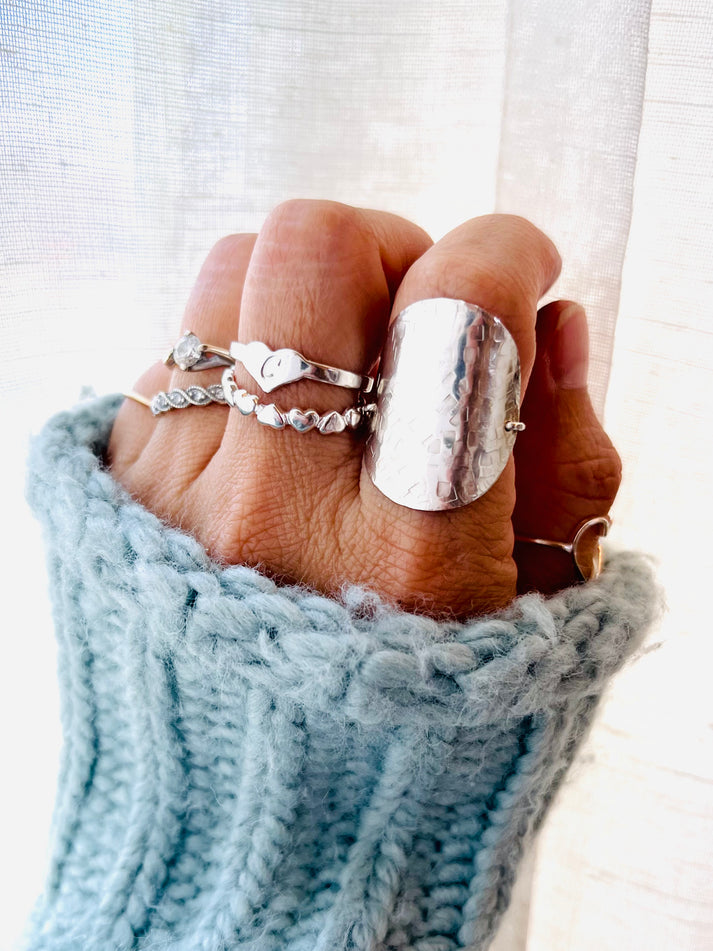 Crafted from high-quality sterling silver, this large disc ring is perfect for everyday wear. With its subtle hammered texture, the ring gives a unique, delicate touch to any stackable or statement ring set. Perfect for minimalist everyday jewelry. Minimalist, Disc Rings, Sterling Silver rings, 