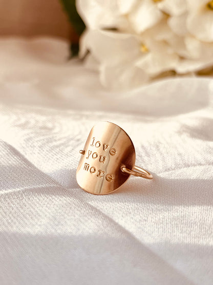 Quote Rings are an effortless way to wear personalized messages around your fingertip. Delicate and stackable, these 14k gold-filled and sterling silver rings can be custom-engraved with your favorite quotes, statements, and names. Express yourself with a unique and meaningful jewelry piece that lasts for years.