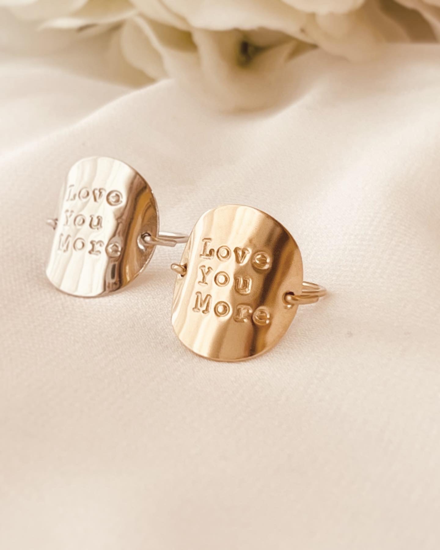Quote Rings are an effortless way to wear personalized messages around your fingertip. Delicate and stackable, these 14k gold-filled and sterling silver rings can be custom-engraved with your favorite quotes, statements, and names. Express yourself with a unique and meaningful jewelry piece that lasts for years.